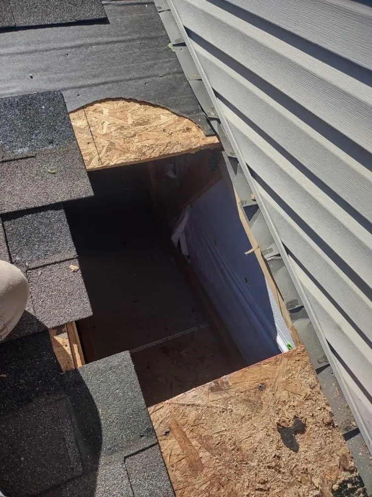 Slide of 4MenRoofing