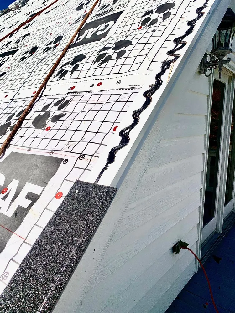 Slide of 50 North Roofing Company