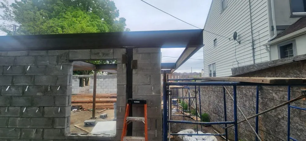 Licensed roof leak repair same-day service across South Richmond Hill, NY - 9 Yards Builders