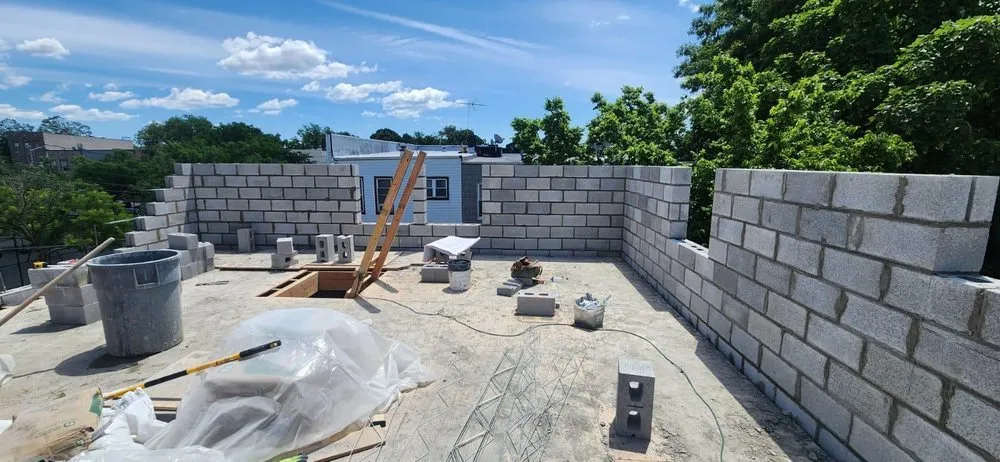 Trusted roof repair in South Richmond Hill, NY by 9 Yards Builders