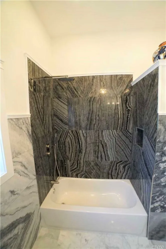 Slide of 911 Alexander Construction