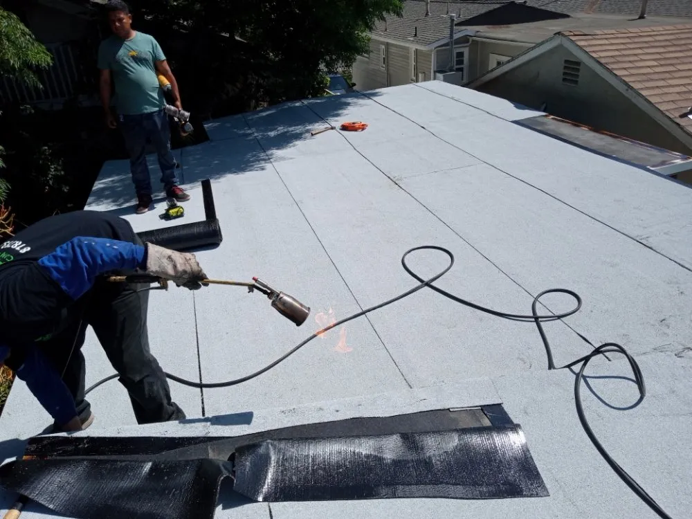 Emergency roof leak repair after storm damage in San Fernando Valley, CA by 911-roofer