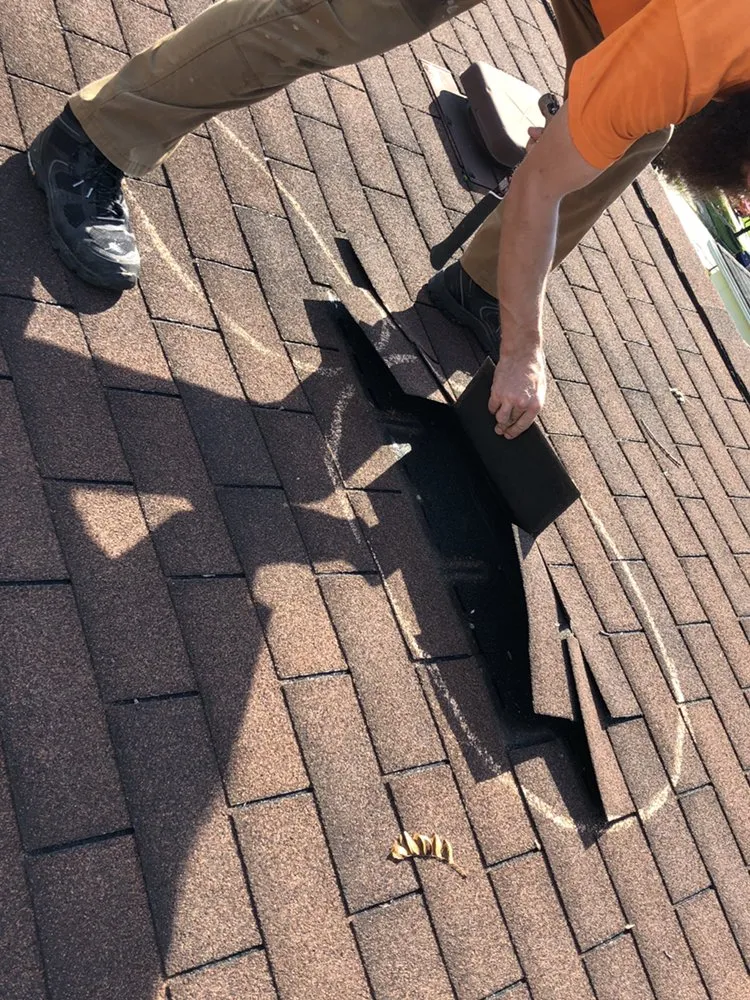 Slide of 911 Roofing