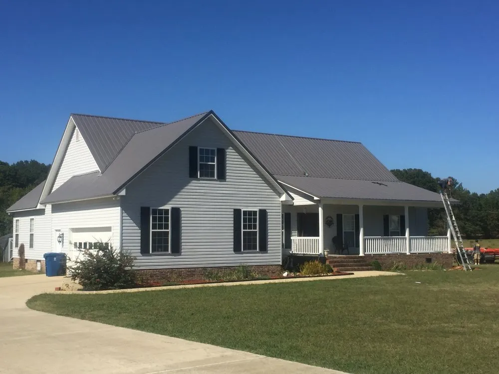 Slide of A & C Metal Roofing