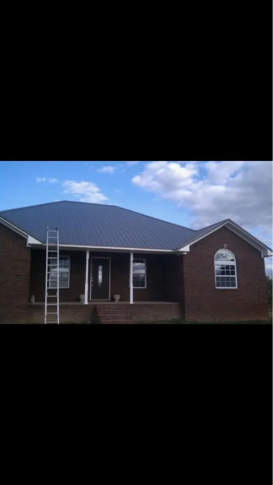 Slide of A & C Metal Roofing