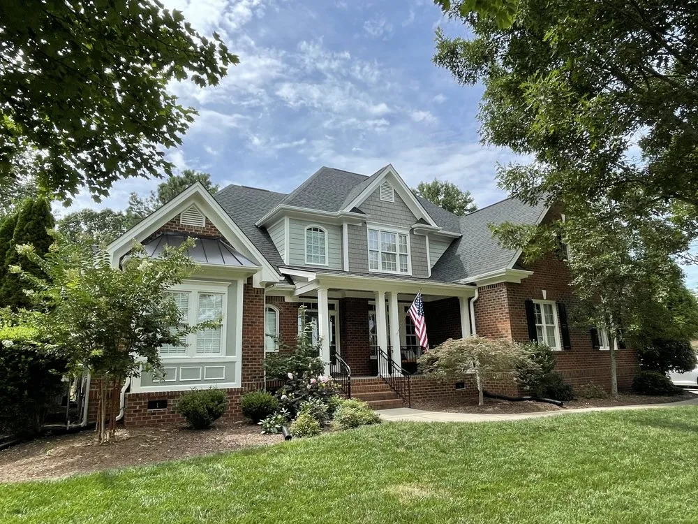 Slide of A & M Premier Roofing & Construction