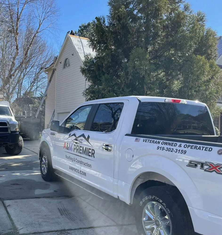 Slide of A & M Premier Roofing & Construction