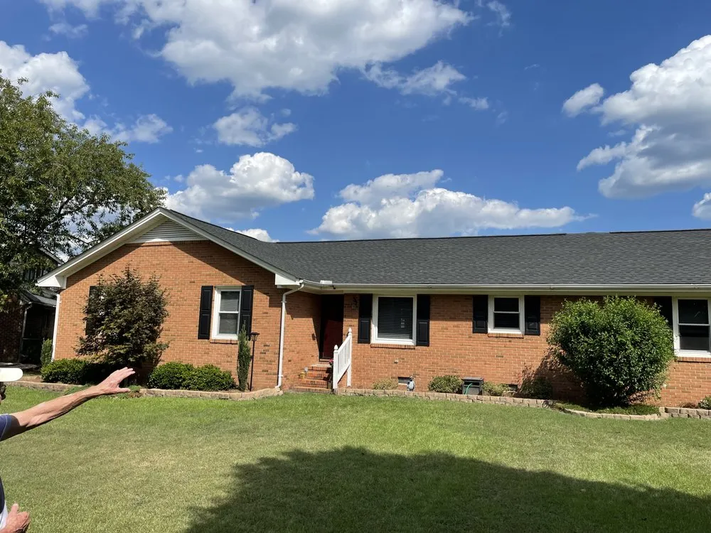 Slide of A & M Premier Roofing & Construction