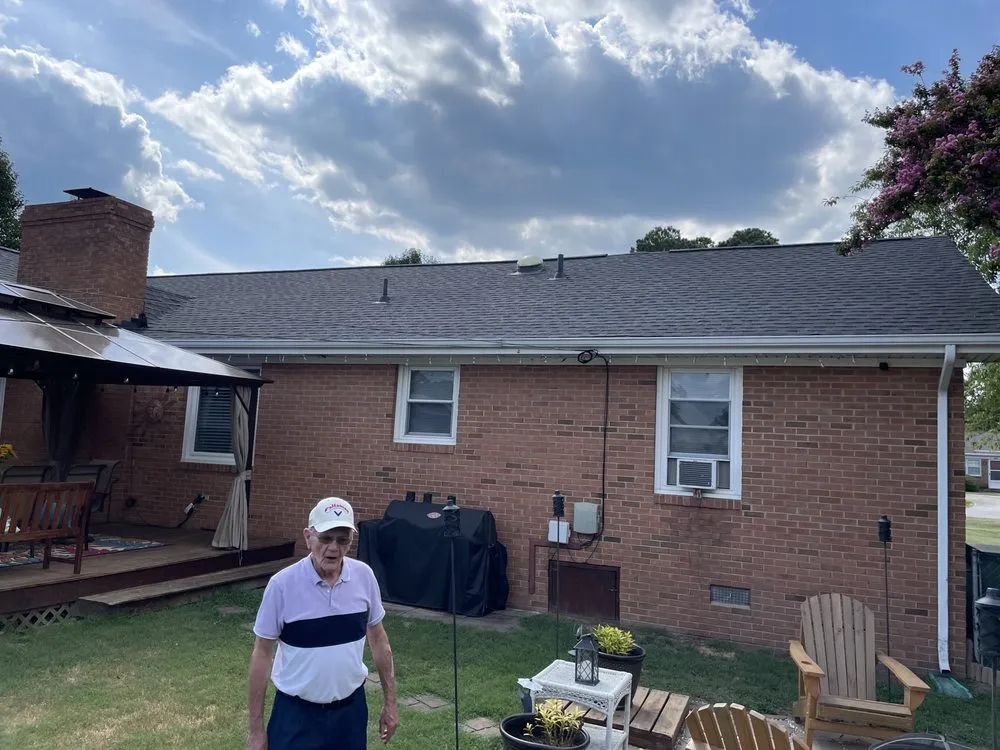 Slide of A & M Premier Roofing & Construction