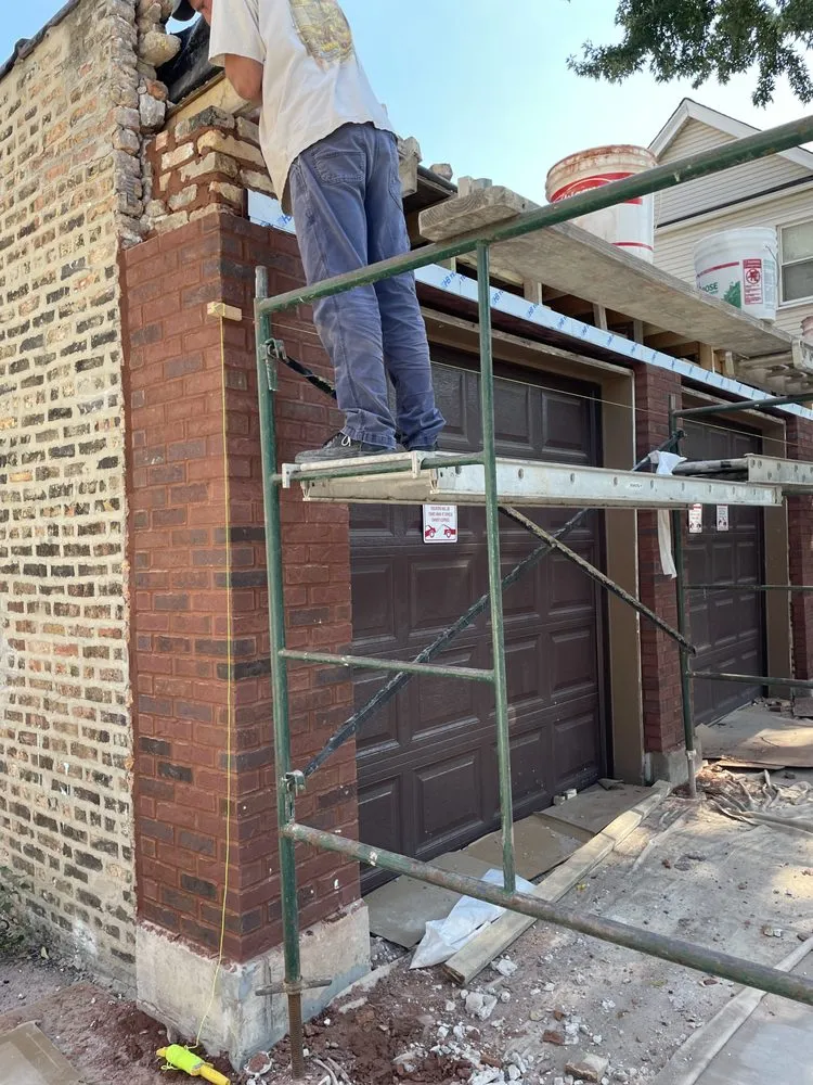 Slide of A & M Roofing Masonry
