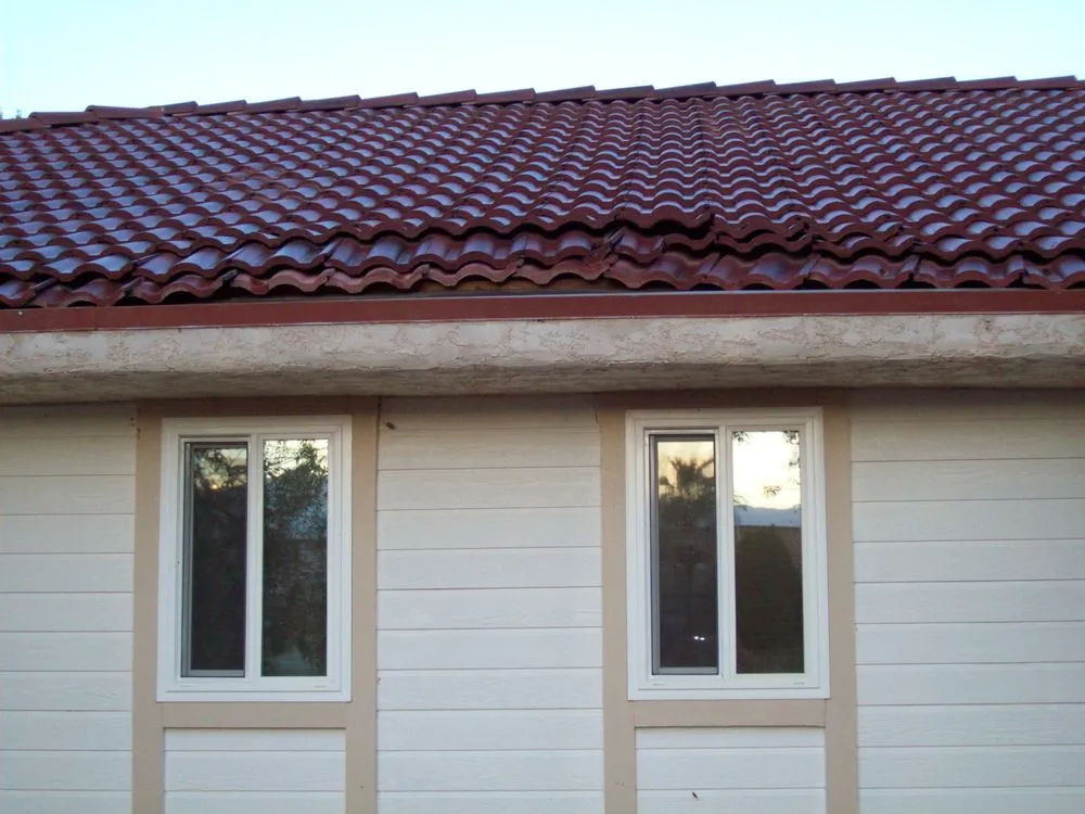 Slide of A B B Roofing