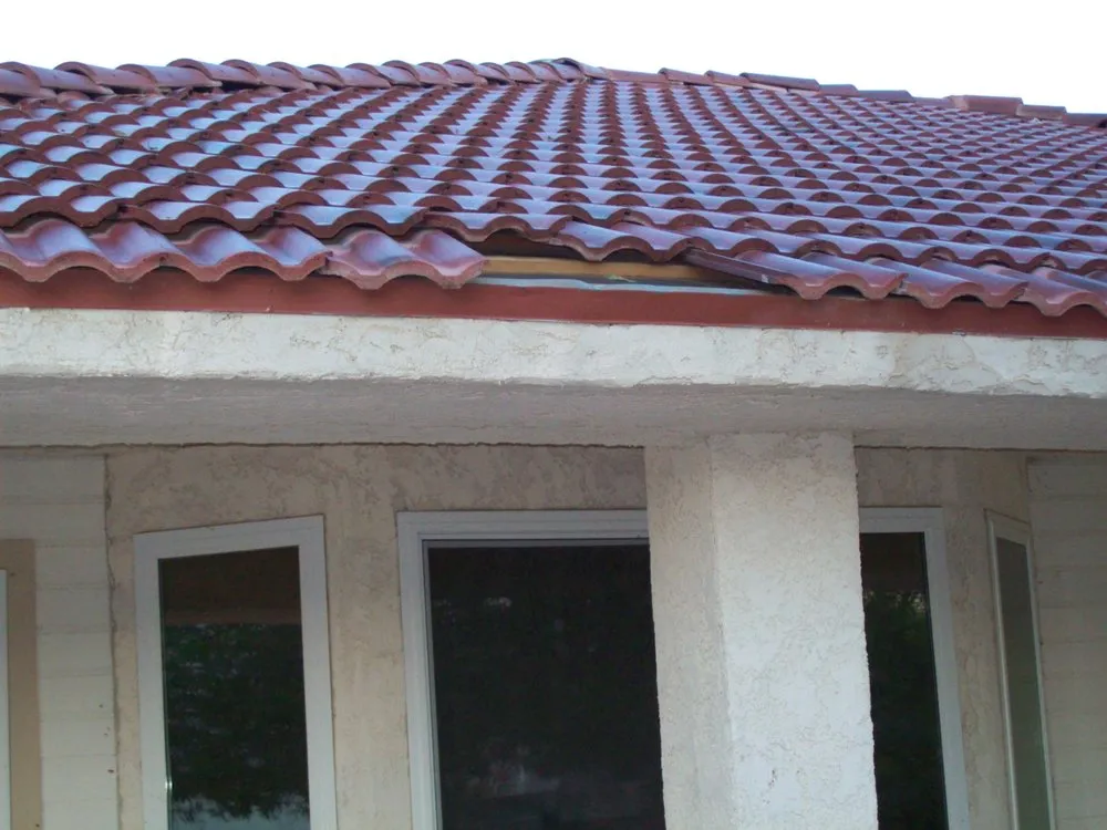 Slide of A B B Roofing