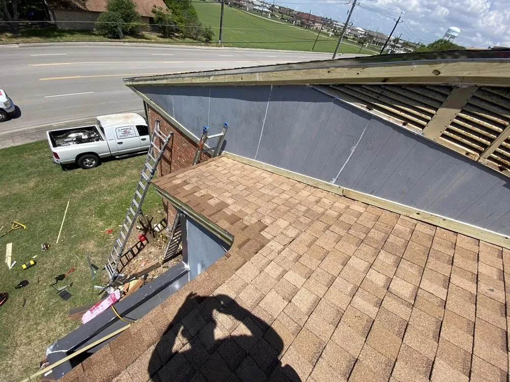 Slide of A Banda M Roofing