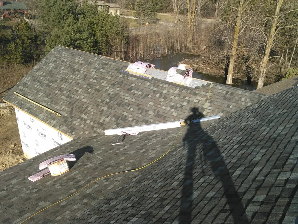 Professional roof replacement after storm damage across Mount Morris, MI - A Better Roof For Less