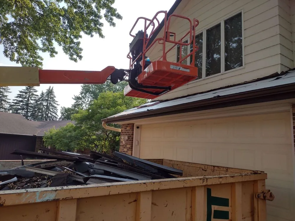 Licensed storm damage roof repair experts serving Glenville, MN - A+ Construction & Landscaping