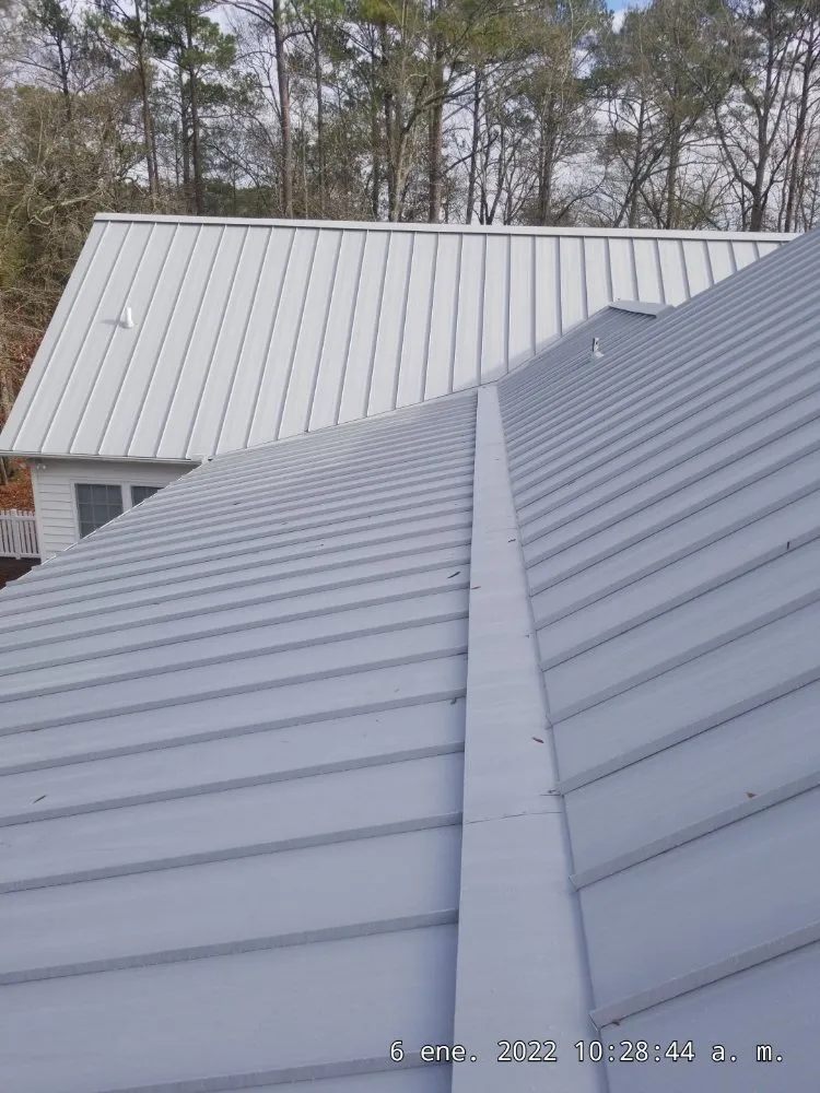 Slide of A-D's Metal Roofing