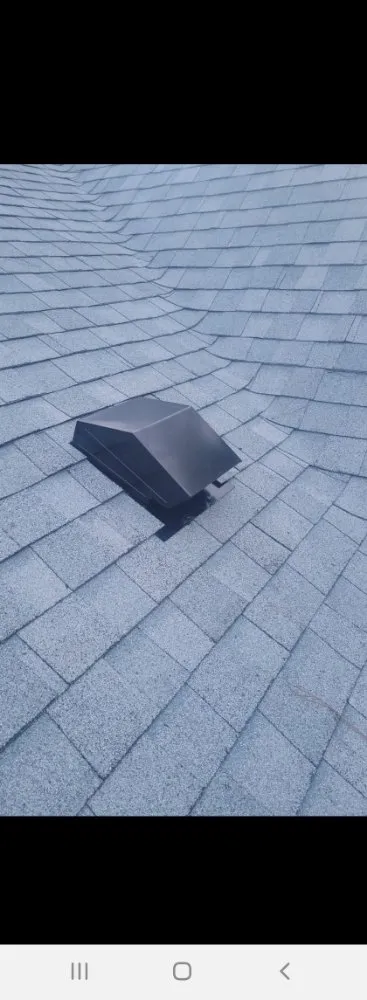 Slide of A-D's Metal Roofing