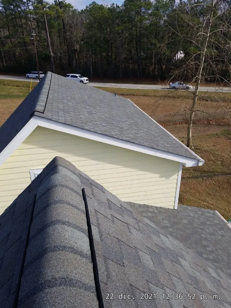 Slide of A-D's Metal Roofing