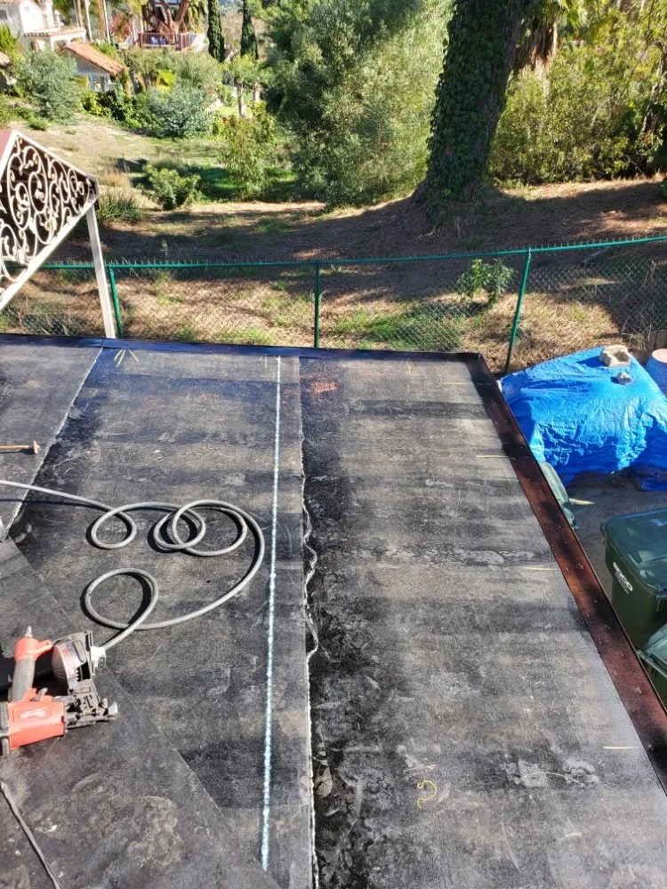 Slide of A DUIN-IT Roofing & Construction