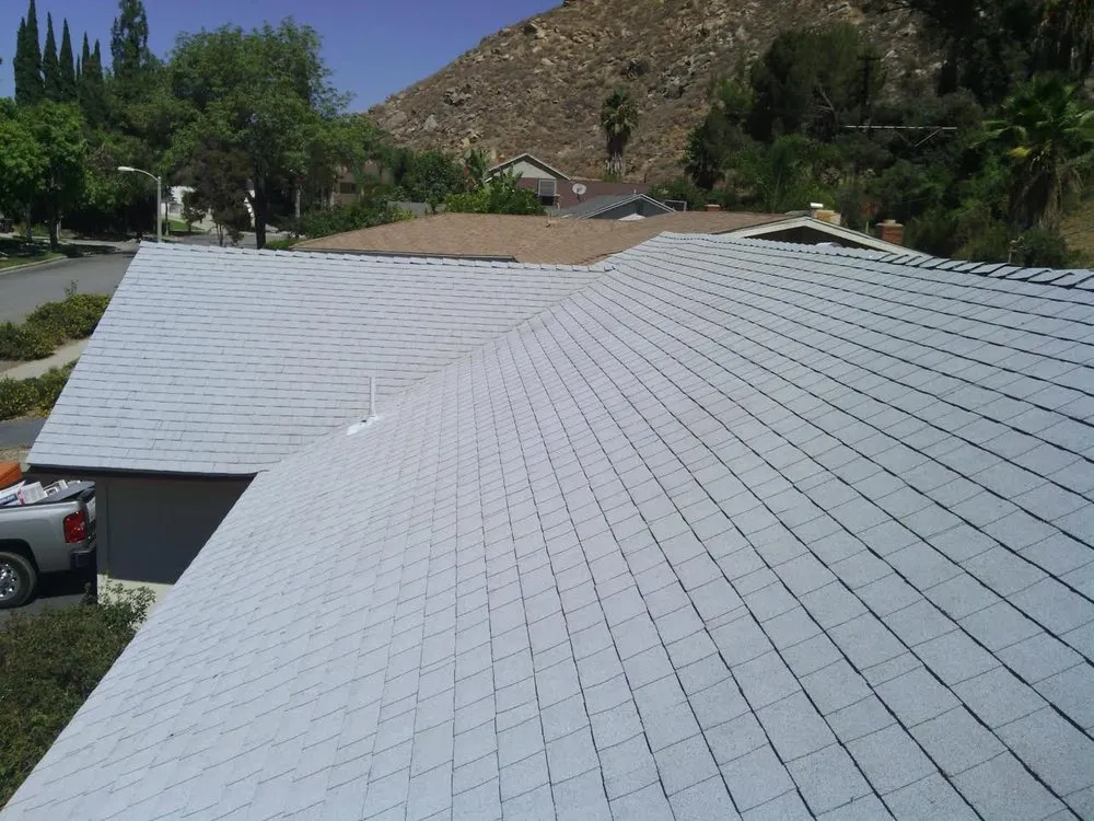 Slide of A E Roofing