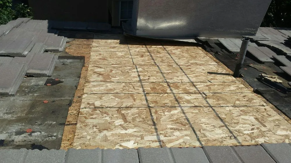 Slide of A E Roofing