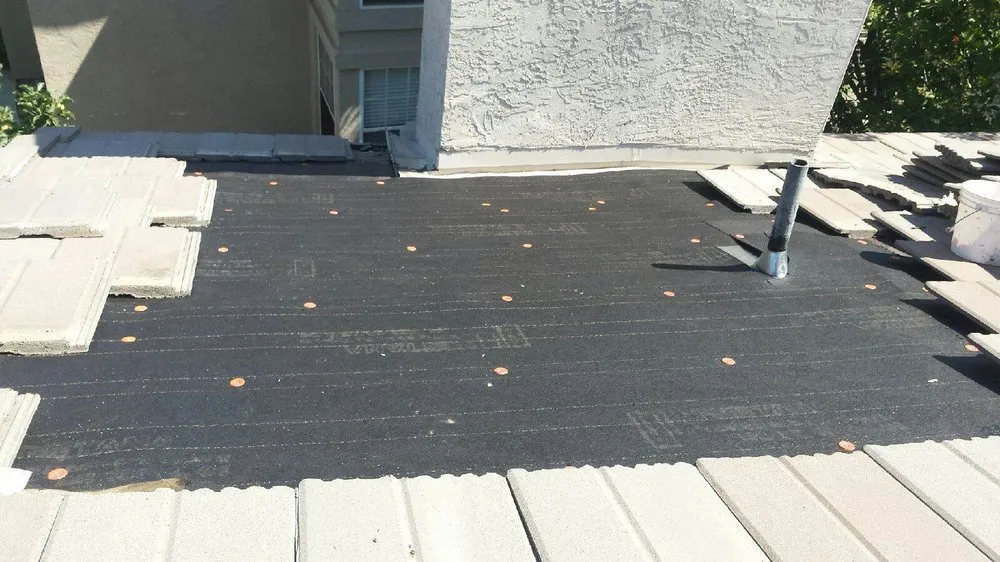 Slide of A E Roofing