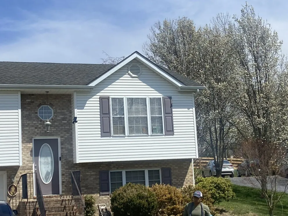 Slide of A G E Roofing