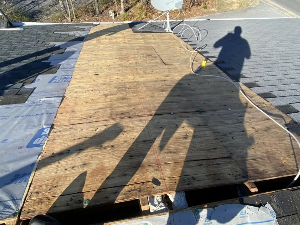 Slide of A G E Roofing