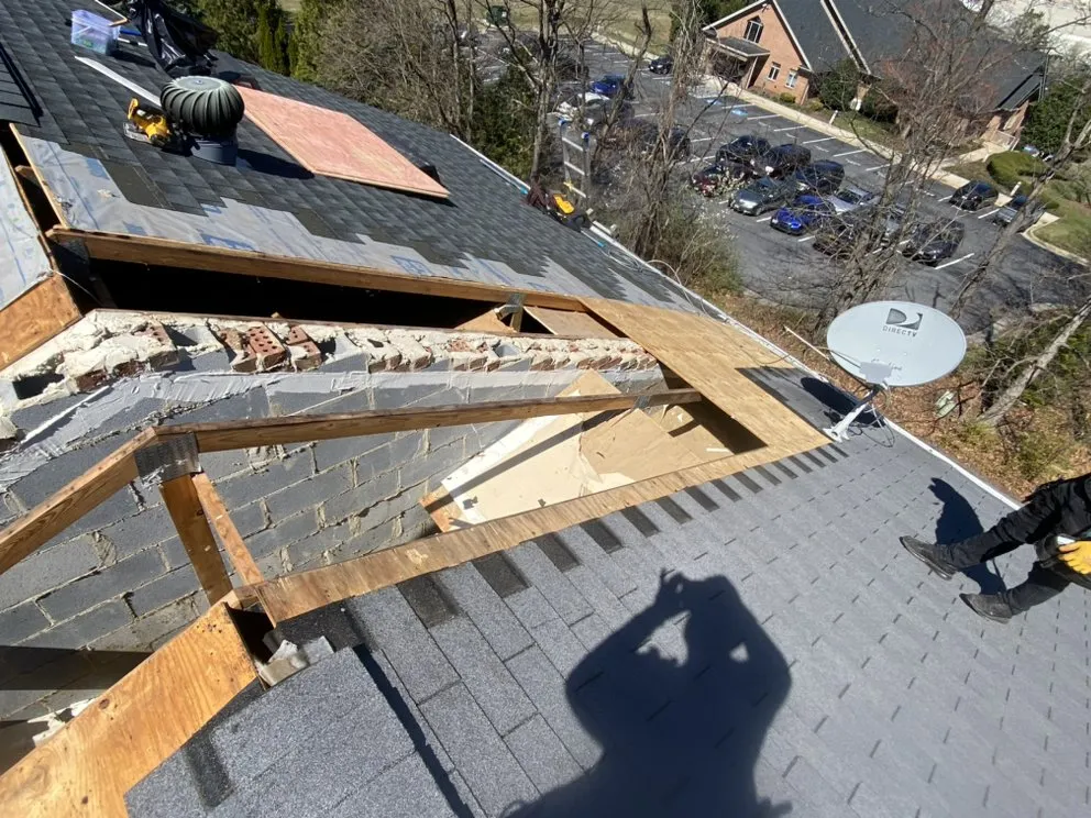 Slide of A G E Roofing