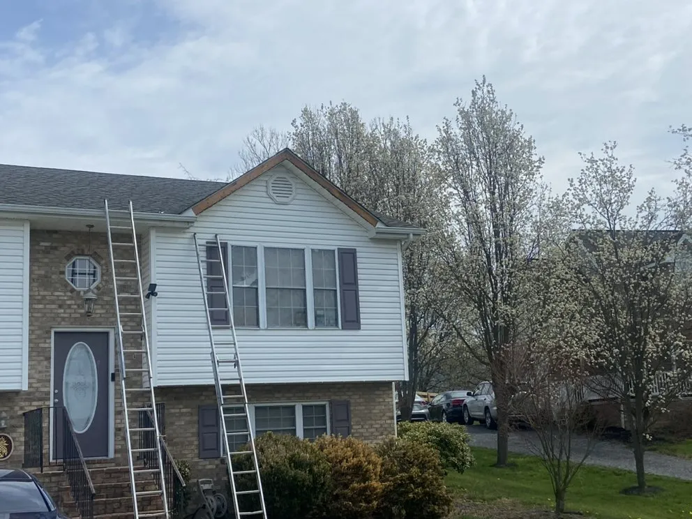 Slide of A G E Roofing