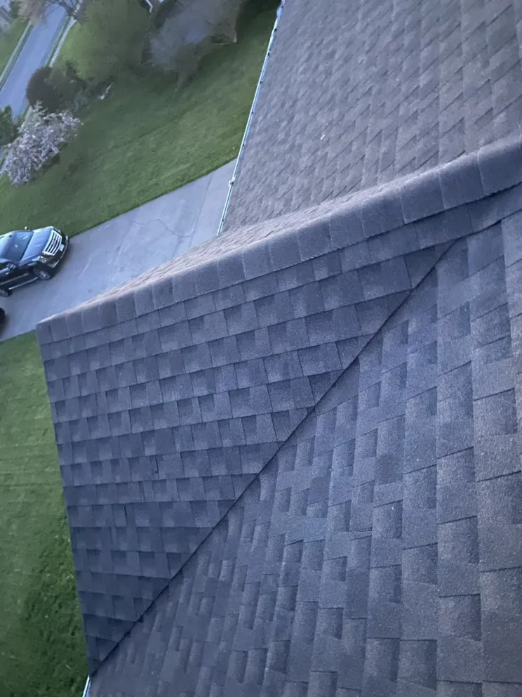 Slide of A G E Roofing