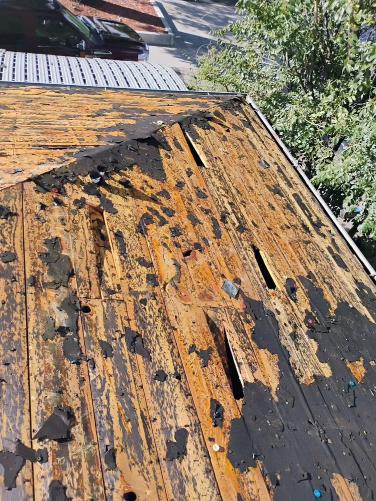 Slide of A-Howell Roofing & Gutters