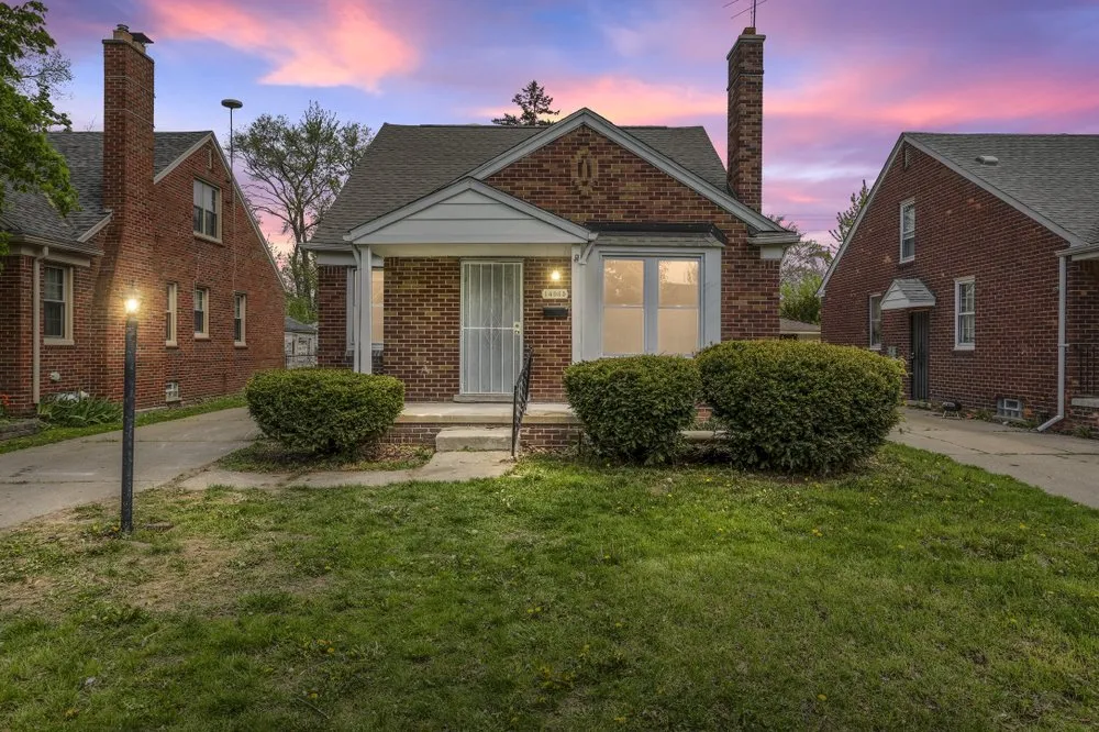 Slide of A J E Roofing