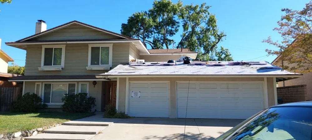 Slide of A. L. Follett Roofing