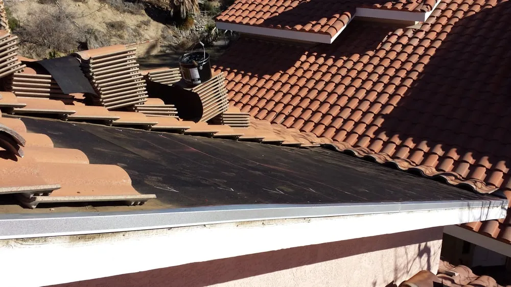 Slide of A. L. Follett Roofing