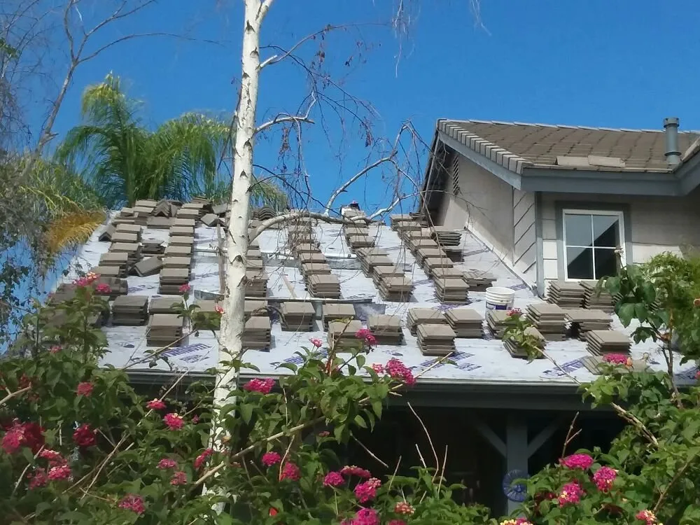 Slide of A. L. Follett Roofing