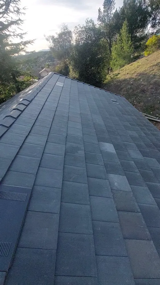 Slide of A. L. Follett Roofing