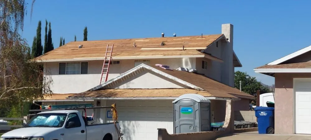 Slide of A. L. Follett Roofing