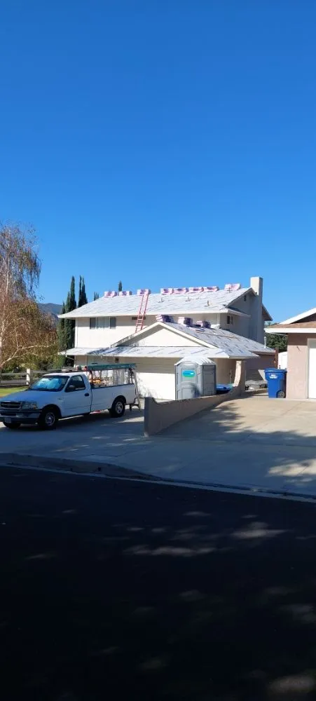 Slide of A. L. Follett Roofing