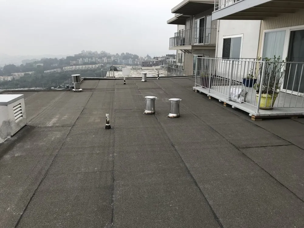 Slide of A L P Roofing