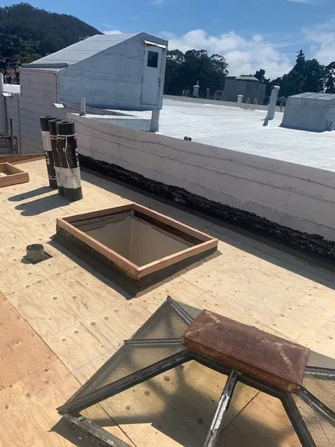 Slide of A L P Roofing