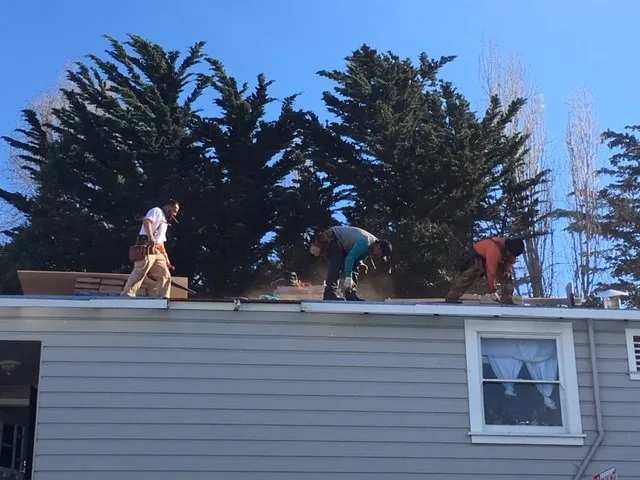 Slide of A L P Roofing