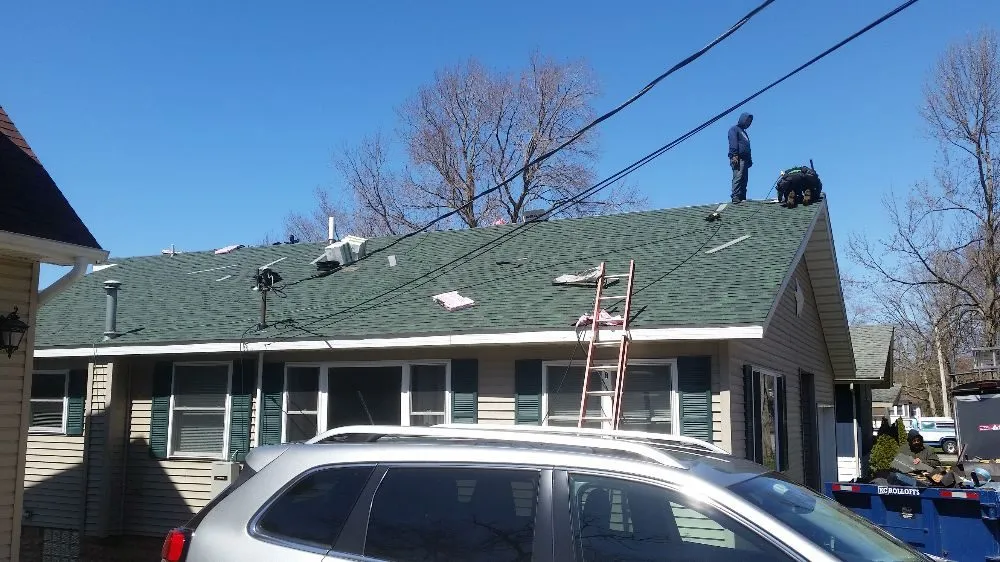 Professional flat roof repair for residential properties in Berrien Center, MI by A L Shembarger Roofing