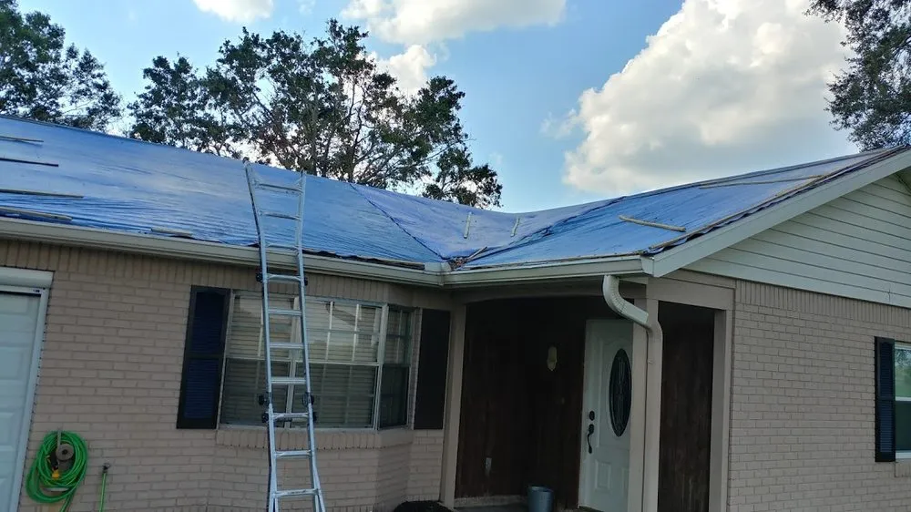 Slide of A Manos Roofing
