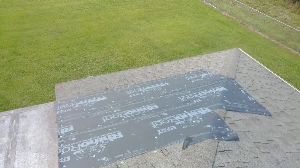 Slide of A Manos Roofing