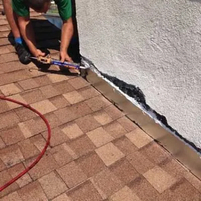 Slide of A Manos Roofing