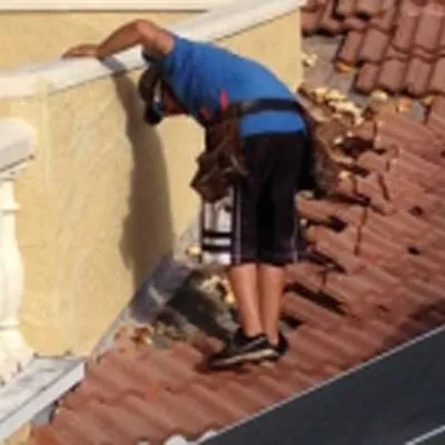 Slide of A Manos Roofing