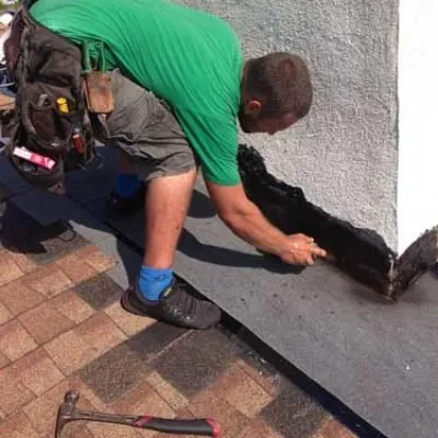 Slide of A Manos Roofing