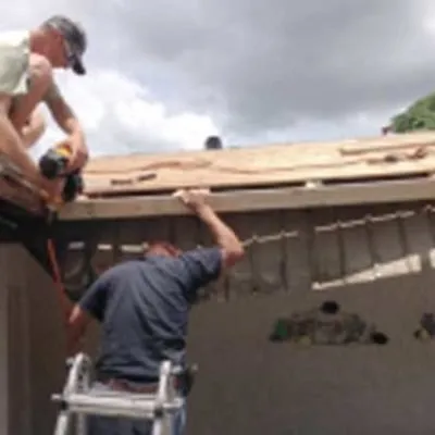 Slide of A Manos Roofing