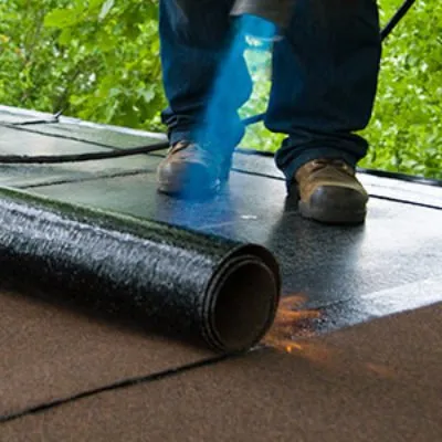 Slide of A Manos Roofing